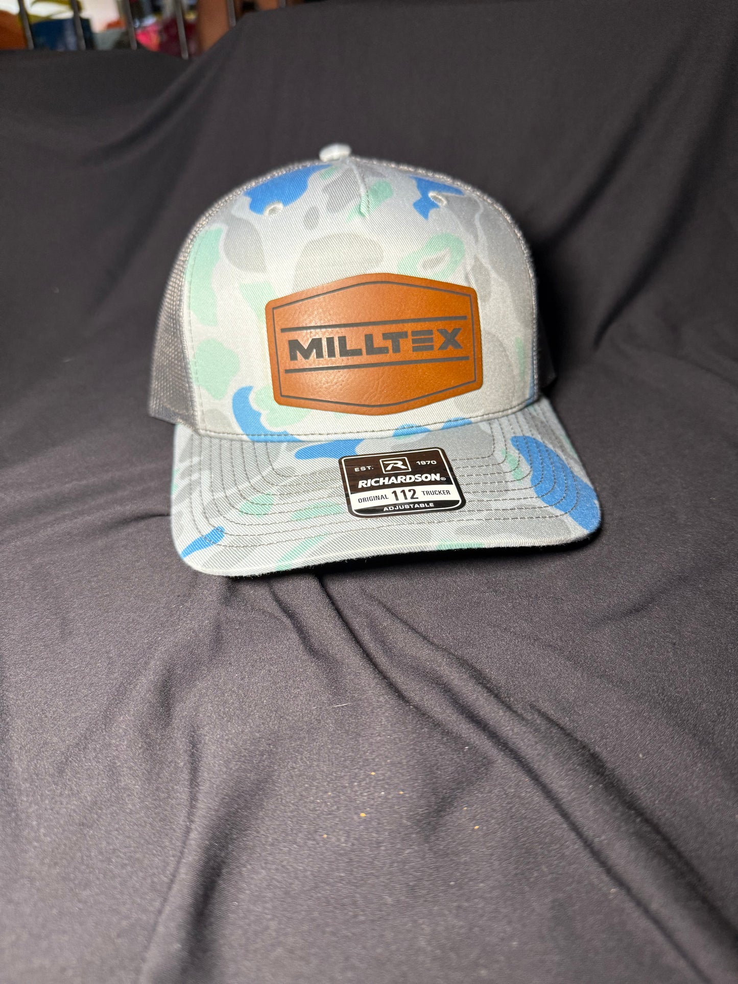 Leather patch(s) & attached