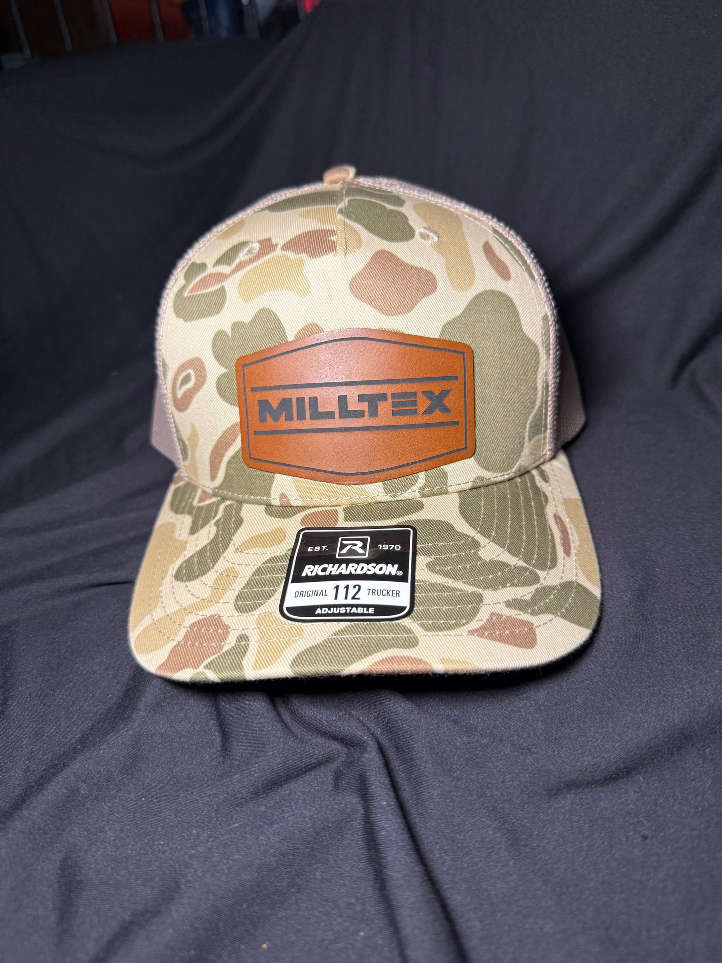 Leather patch(s) & attached